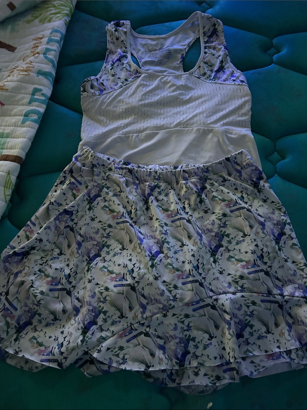 Ladies tennis skirt and racer back tank set . Top is Medium. Skirt is small